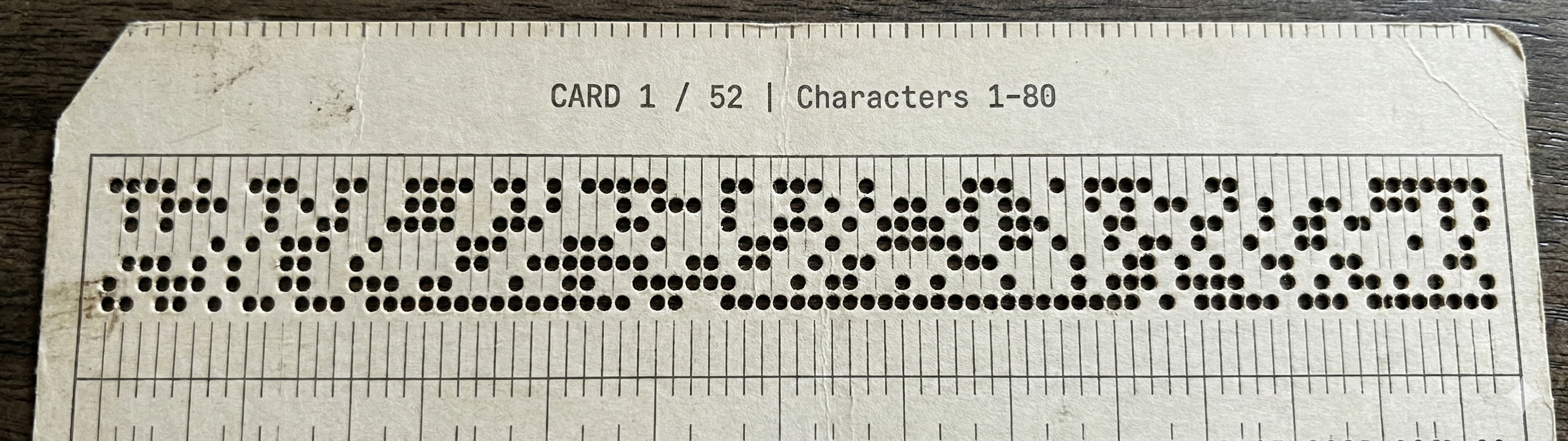 Vintage IBM punch card with neural network code